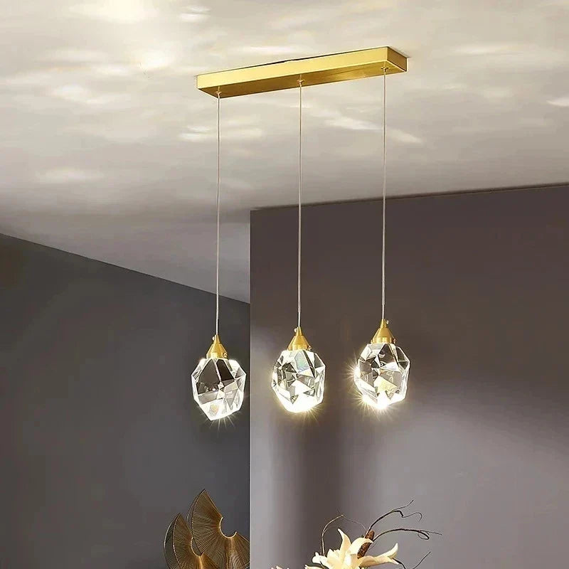Maison Ornate Modern Crystal Chandelier with gold fittings and LED-lit crystal glass shades.