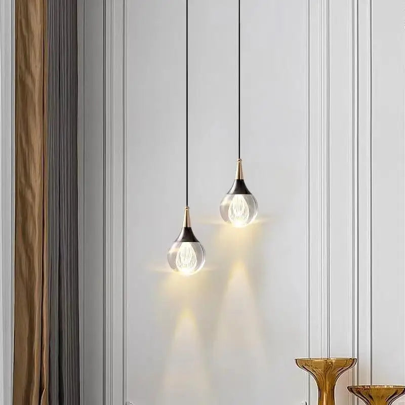 Maison Ornate Modern LED Crystal Chandelier features intricate crystals and gold accents, elegantly suspended from ceiling.