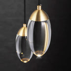 Two luxury crystal industrial chandeliers with copper elements, warm glow, elegant LED-inspired design.