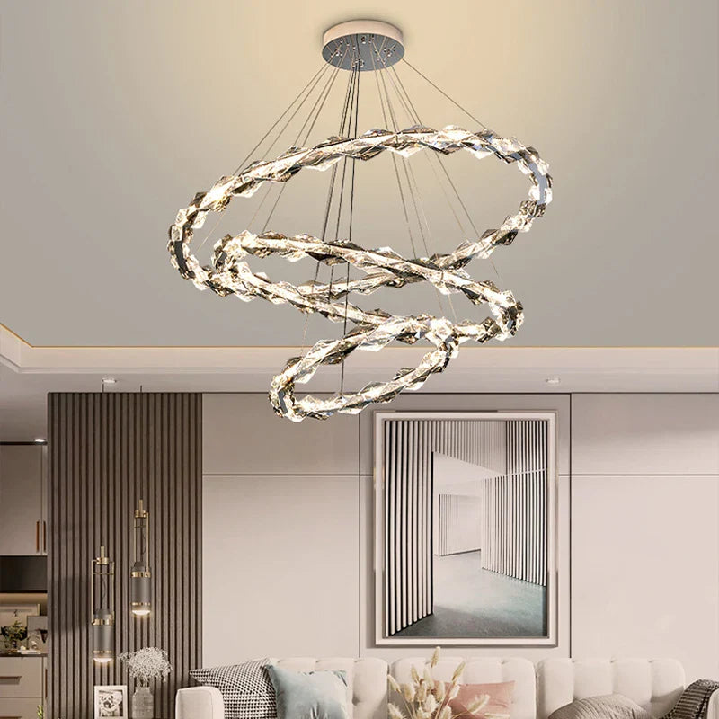 Maison Ornate Modern Crystal Hallway Chandelier with three intertwined LED-lit rings and metal suspension.