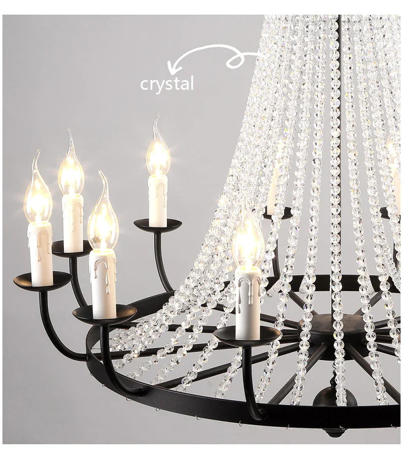 Maison Ornate Industrial Crystal Chandelier with lit candle bulbs, black iron arms, and acrylic crystals.
