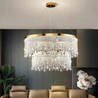 The Maison Ornate Modern Crystal Chandelier features gold round pendants in an elegant, contemporary design.