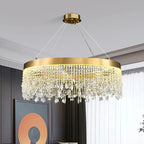 Maison Ornate Modern Crystal Chandelier features gold round pendants and cascading prisms for a luxurious statement.