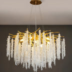 Gold-branch crystal LED chandelier with cascading clear beads, creating a sparkling, elegant overhead accent.