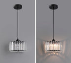 Maison Ornate Art Deco Crystal Chandelier with black mount shown off left and warmly lit right.