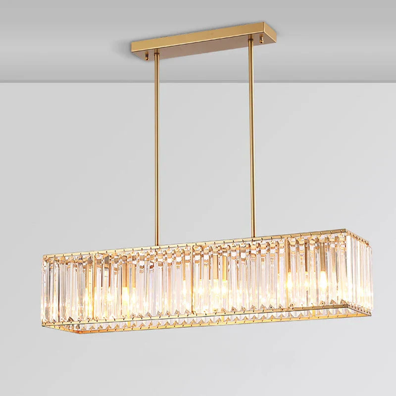 Rectangular LED crystal chandelier with gold frame, vertical prisms, two rods, and elegant warm glow.