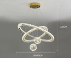 Ornate golden chandelier with two LED rings and starry glass balls, gold mount, modern design.
