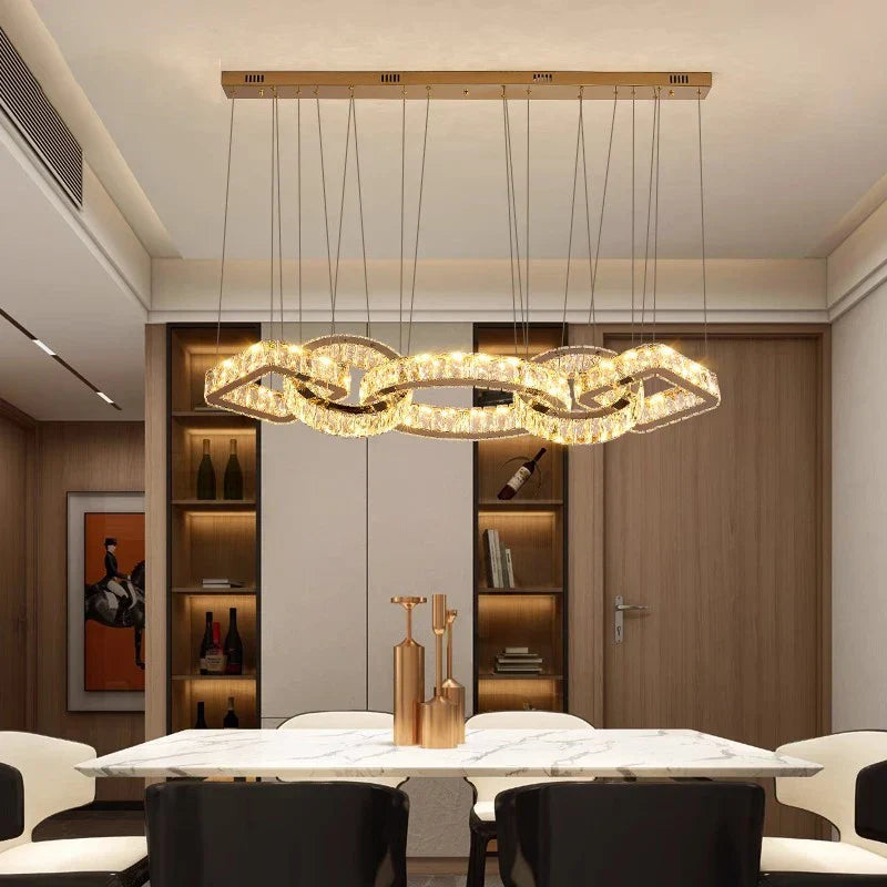 Maison Ornate Modern Gold Crystal Indoor Pendant Lighting with intricate crystal accents and sleek gold finish.
