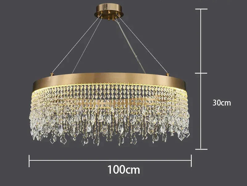 Modern crystal chandelier with gold round pendants, iron frame, and hanging crystal prisms.