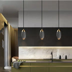 Three Maison Ornate Luxury Crystal Industrial Chandeliers with copper accents, warm light, elegant design.