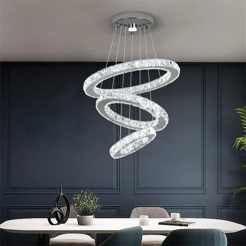 Maison Ornate Luxury Crystal Pendant Light with three illuminated rings, modern chandelier design.
