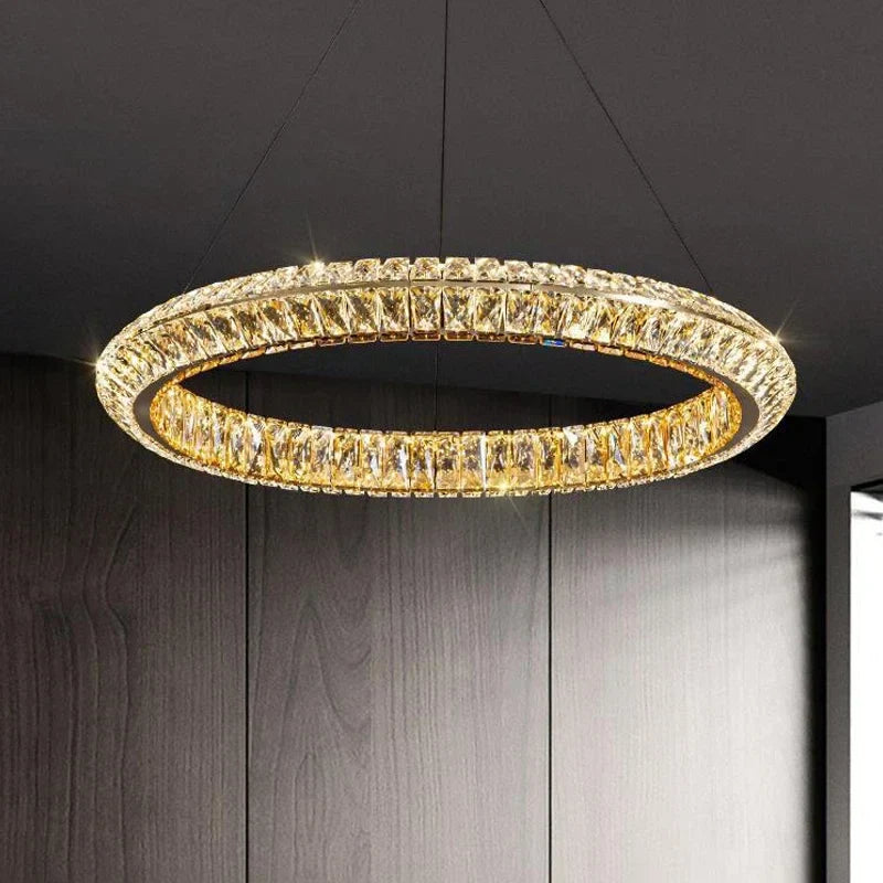 The Maison Ornate Modern Crystal LED Chandelier features gold accents and luxurious contemporary design.