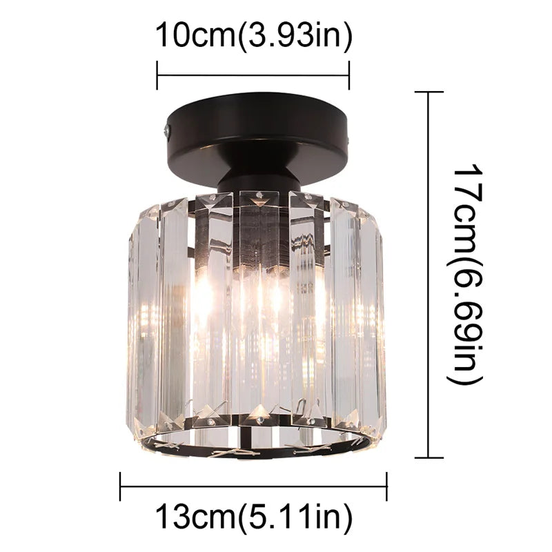 Maison Ornate K9 Crystal Art Deco chandelier with round black base and clear vertical crystal prisms.