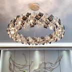 Elegant modern stainless steel crystal LED chandelier with square crystal accents and warm ambient illumination.