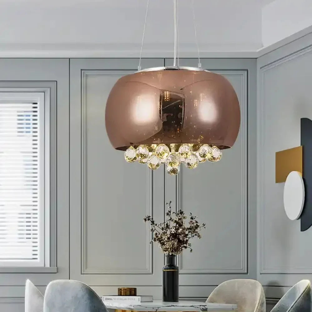 Maison Ornate Modern Crystal Hanging Light features elegant crystal details and sleek modern lines.