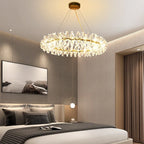 Maison Ornate Crystal Hallway Chandelier with illuminated rings and floral crystal details overhead.