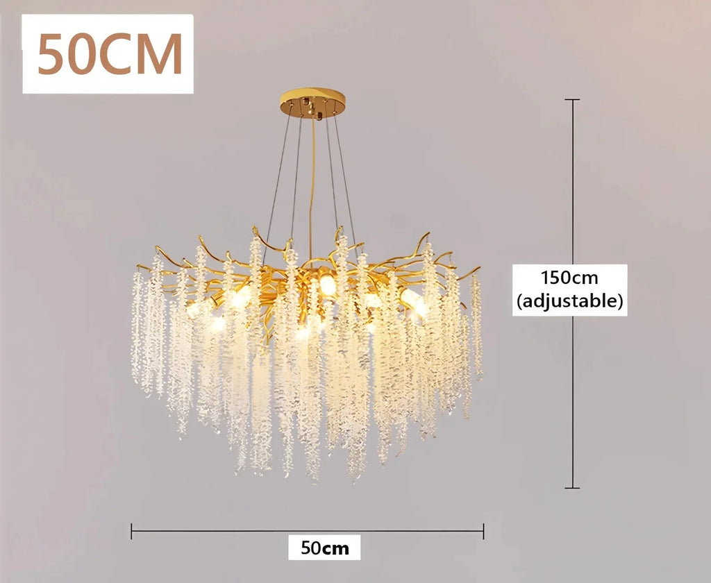 Gold metal modern chandelier with cascading crystals, 50 cm wide, adjustable to 150 cm.
