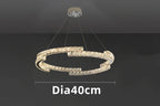 Maison Ornate Crystal Chandelier with dual offset rings, LED-lit, stainless steel, suspended design.