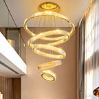 Maison Ornate Modern Crystal Chandelier with spiral gold rings and LED lights, luxurious contemporary design.