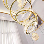 Maison Ornate Crystal Chandelier with gold smart rings, dimmable LED, and crystal accents.