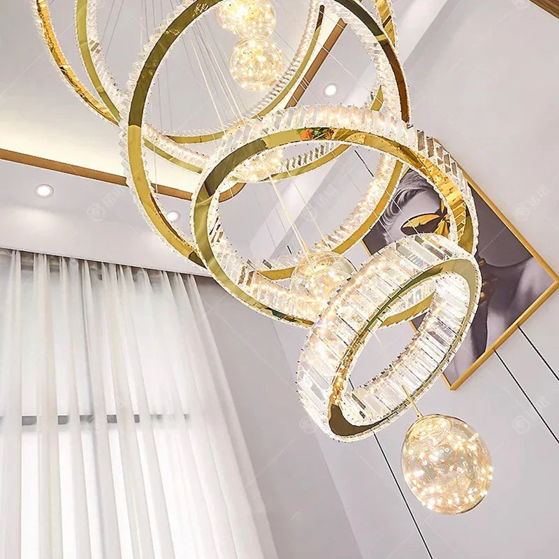 Maison Ornate Crystal Chandelier with gold smart rings, dimmable LED, and crystal accents.