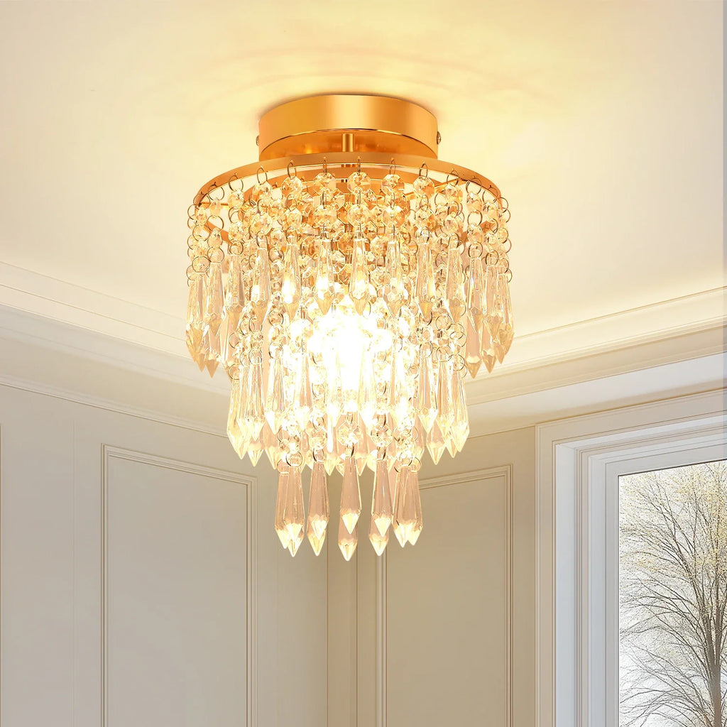 Maison Ornate Modern Crystal Art Deco Chandelier with gold stainless frame and hanging prisms.
