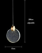 Modern gold LED Nordic chandelier with glittery 13 cm crystal disc, adjustable black cord.