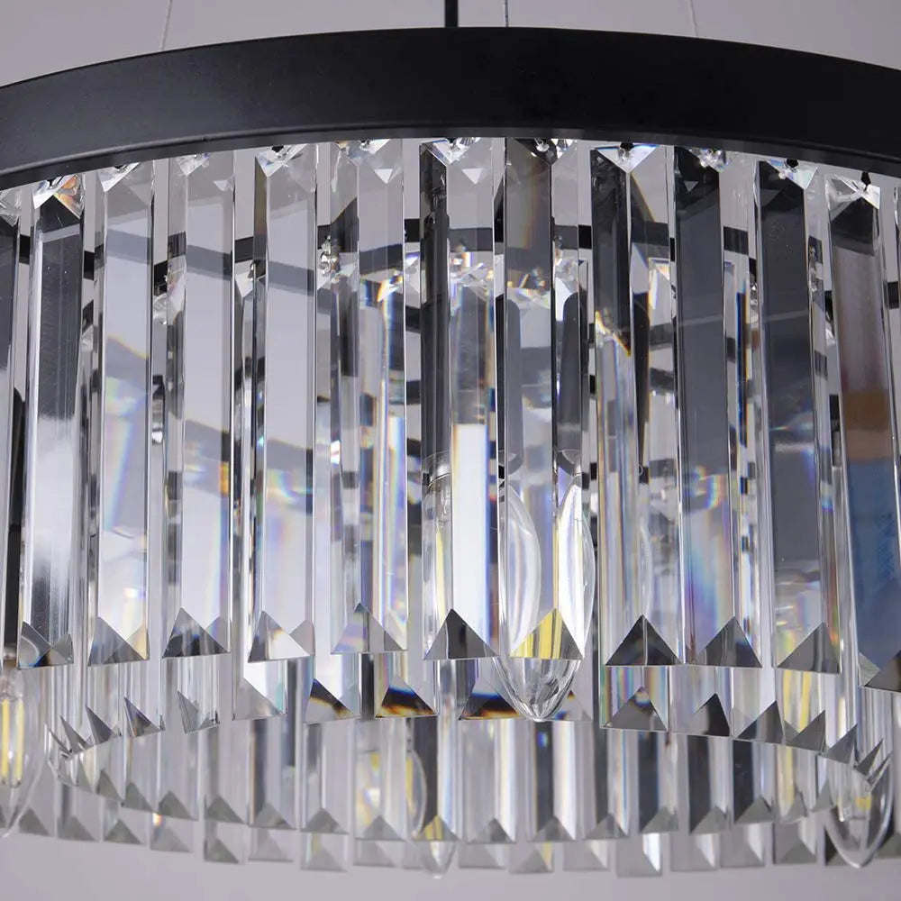 Close-up of Maison Ornate Nordic chandelier with black circular frame and vertical crystal prisms.