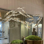 Maison Ornate Modern Crystal Hallway Chandelier with multiple oval-shaped LED lights, luxury product.