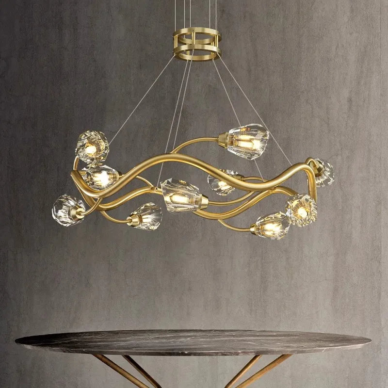 The Modern LED Crystal Pendant by Maison Ornate features a gold wavy frame and glass covers.