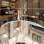 Maison Ornate Modern LED Crystal Chandelier with adjustable height and glass droplets, designed for large stairways.