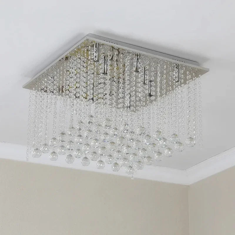 Maison Ornate Art Deco chandelier with cascading crystal beads and glass spheres, modern LED design.