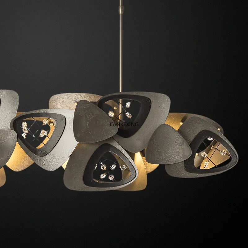 Maison Ornate Industrial Crystal Chandelier features triangular metallic plates, glass pieces, and LED-lit crystals.