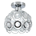 Spherical chandelier with chrome finish and clear crystal accents, ideal for modern hallway lighting.