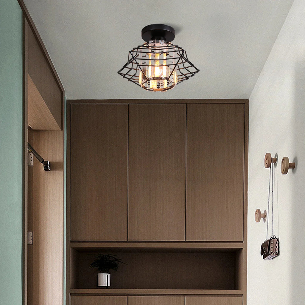 Maison Ornate Crystal Hallway Chandelier with black metal cage and exposed bulb, modern industrial style.