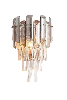 Elegant crystal bedroom chandelier with vertically stacked clear and tinted glass for a modern effect.