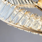 Maison Ornate Modern Dimmable LED Crystal Glass Chandelier with rings and triangular prisms, reflecting rainbow light.