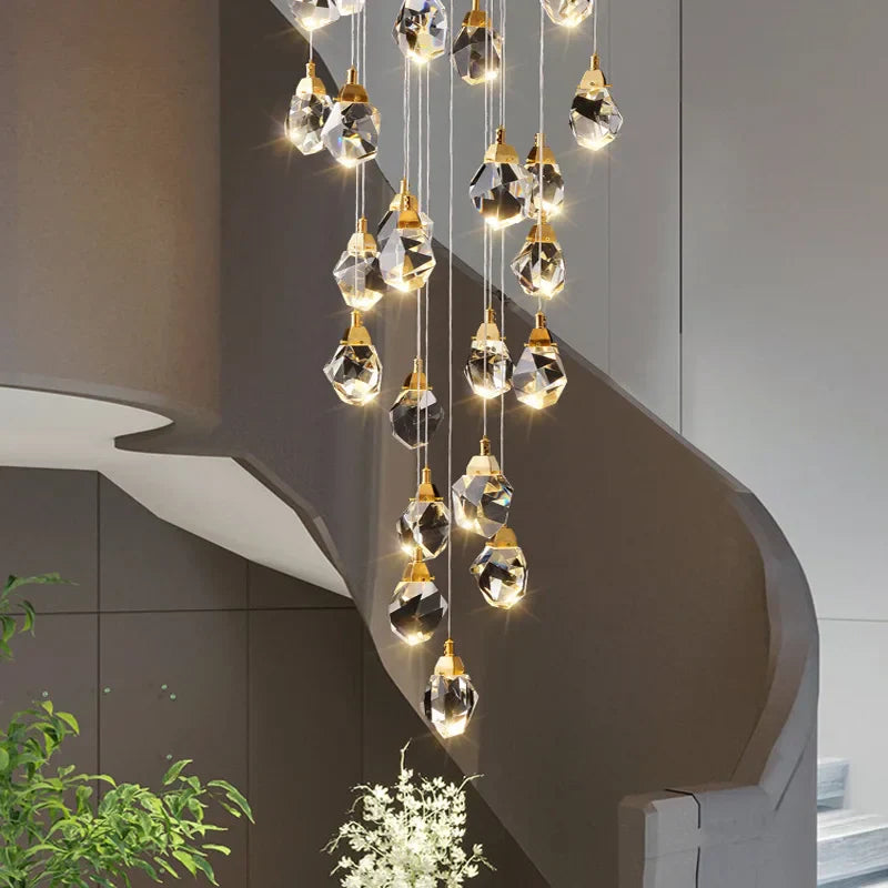 Maison Ornate Elegant Crystal Chandelier with LED pendants hanging at varied heights, modern design.