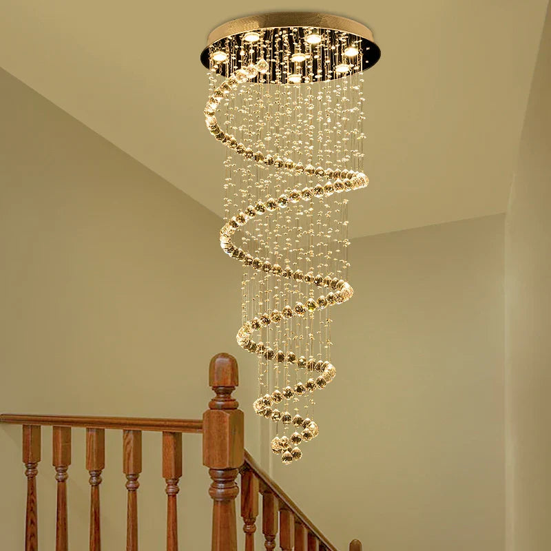 Maison Ornate Duplex Spiral Crystal Pendant Light with hanging crystal beads and warm lighting.