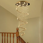 Maison Ornate Duplex Spiral Crystal Pendant Light with hanging crystal beads and warm lighting.