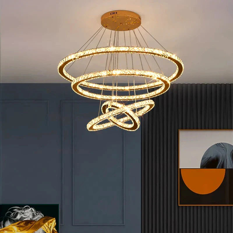 Maison Ornate Modern LED Crystal Chandelier with multiple glowing circular rings, elegant and contemporary.