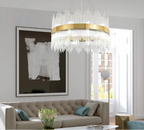 Maison Ornate’s Modern Gold Crystal Chandelier with elegant tassels, sophisticated and radiant ceiling lighting.