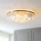 Elegant geometric gold frame chandelier with crystal prisms emitting warm, sparkling light. Modern, ornate design.