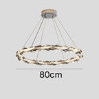 Modern crystal chandelier with jagged ring design, dimmable LED lights, 80cm diameter, metal suspension.
