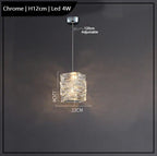 Modern chrome chandelier with textured K9 crystal shade, 12 cm wide, adjustable cord, 4W LED.