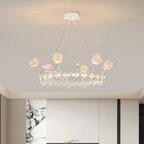 Crown-shaped crystal ball chandelier with globe lights and ornate details for kids' rooms.