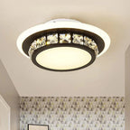 The Maison Ornate LED chandelier features circular design and faceted crystal accents for modern elegance.