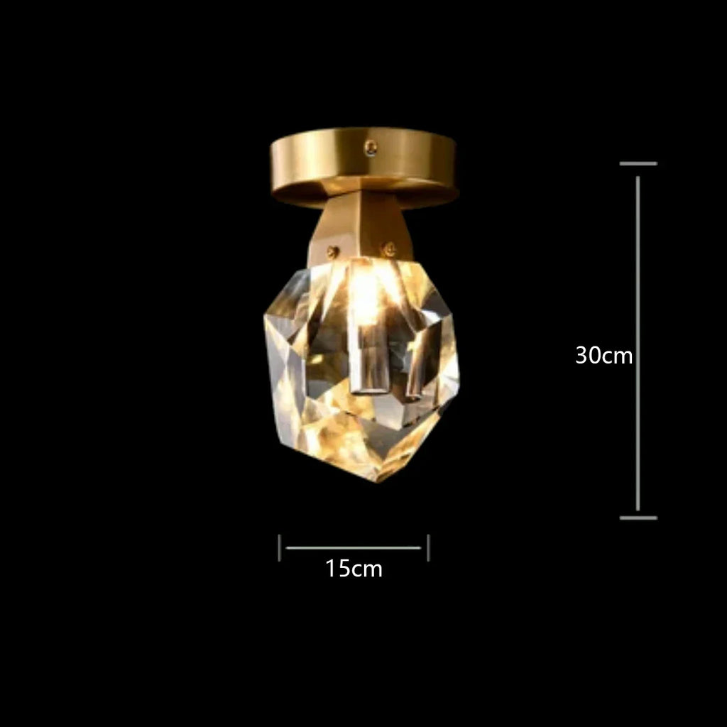 Modern Glass Crystal Chandelier with brass frame, geometric crystal shade, warm LED light, 30x15 cm.