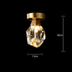 Modern Glass Crystal Chandelier with brass frame, geometric crystal shade, warm LED light, 30x15 cm.