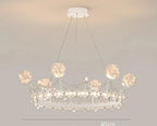 Whimsical crown-shaped chandelier with sparkling crystals and glass orbs, ideal for stylish kids' rooms.